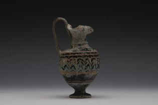 A Glass Amphoriskos (Perfume Bottle) from the Roman Period or Later. H: Approximately 12cm