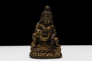 A Fine Tibetan Bronze Gilt Tantrik Representation of Jambhala Buddhist Statue from the 18th Century.