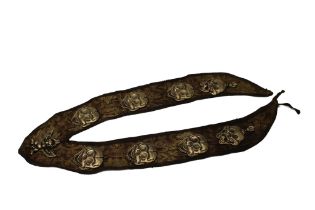 A Tibetan Brass Skull Amulet Necklace. L: Approximately 75cm