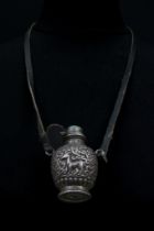 A Chinese Tibetan Silver Snuff Bottle Necklace with Animal Decorations with a Leather Cord.