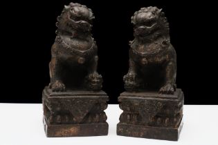 A Pair of Chinese Tibetan Bronze Gilted Figures of Foo Lions with Four-Figure Character Marks to the