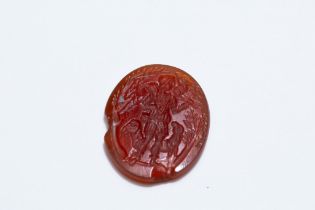 A Roman Carnelian Intaglio of a Shepherd Carrying a Lamb Among his Flocks from Circa 1st-2nd Century