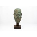 A Bronze Figure of a Greek Statesman's Head or Probably a Dignitary. 

H: Approximately 37cm

The fo