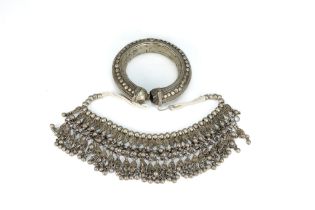 A Lot of Tribal Yemeni Jewellery.

1 White Metal Necklace - 155g
1 White Metal Bracelet - 85g 