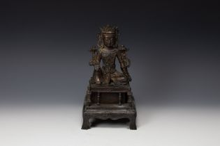 A Tibetan Bronze Gilted Buddhist Seated Figure of Guan Yin. H: Approximately 25cm