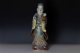 A Chinese Large Famille Rose Enamel Porcelain Figure of a Man Holding a Baby.

H: Approximately 49.5