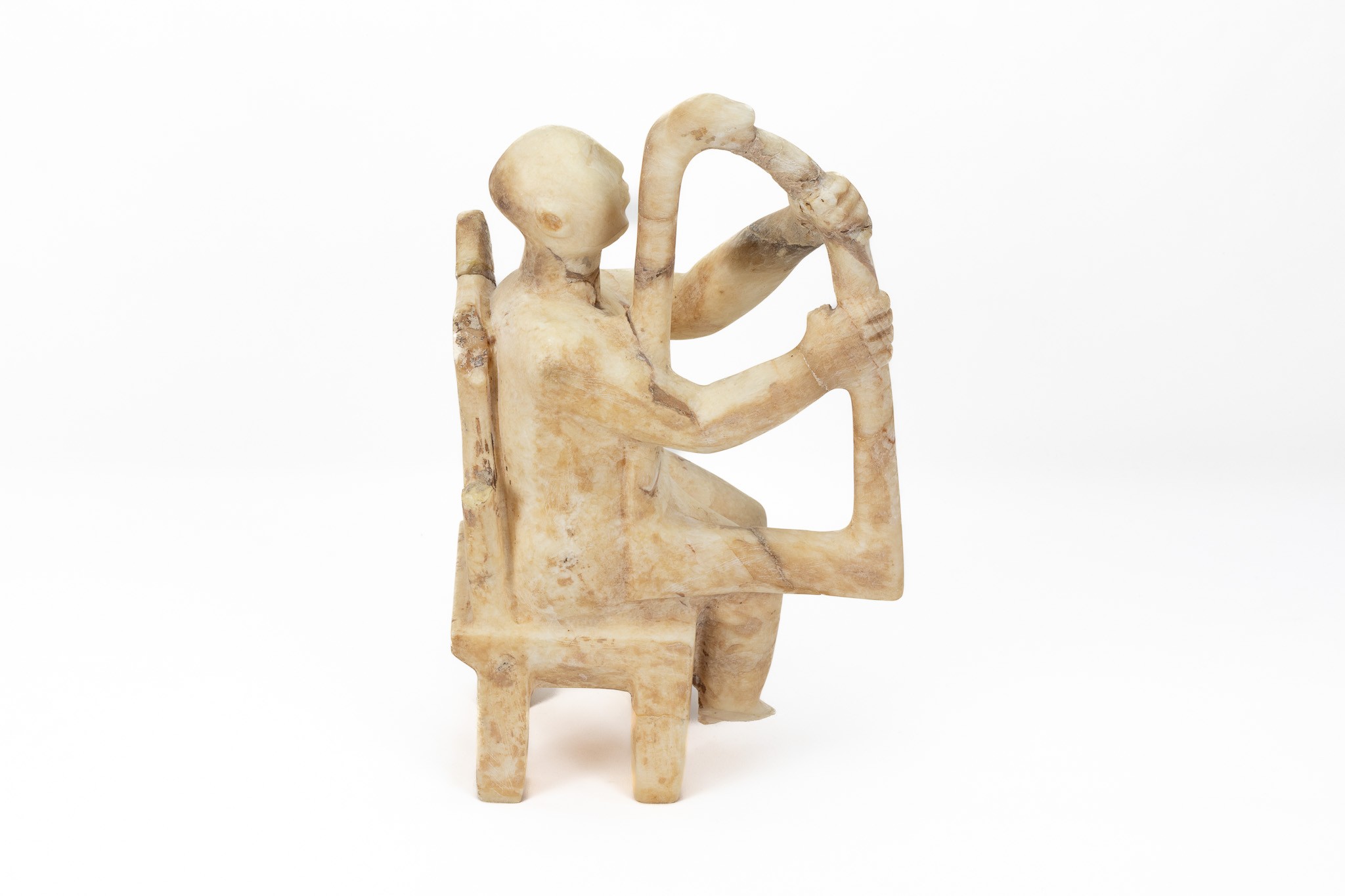 A White Marble Seated Musician in the Style of the 3rd Millennium B.C of the Cyclonic Period.

H: Ap - Image 2 of 4
