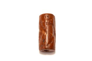 A Red Jasper Cylindrical in the Style of the Assyrian Period. L: Approximately 3.7cm