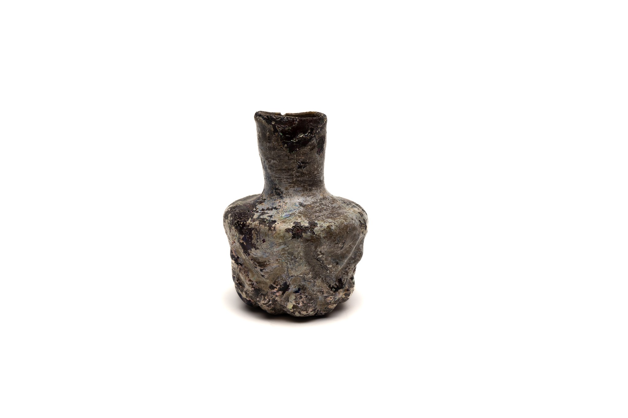 An Islamic Dark Glass Bottle with Lovely Patina and Design from the 11-12th Century.

H: Approximate - Image 3 of 4