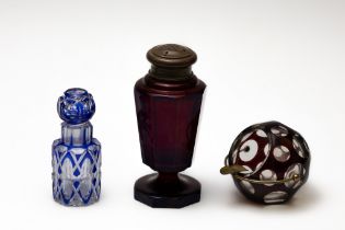 A Lot of 3 Antique Bohemian Glass from the 19th Century.

Includes:

A Blue Scent Bottle
A Red Salt 