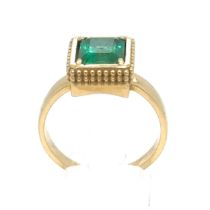 An Emerald Ring in Yellow Gold.

Emerald Weight: Approximately 2.35ct
Stamped 750 
Ring Size: U / US