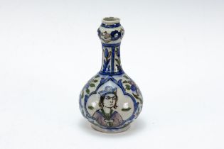 An Islamic Qajar Ceramic Vase from the 19th Century Depicting Floral Patterns. H: Approximately 28c