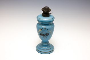 A Victorian Blue Opaline Oil Lamp from the 20th Century.

H: Approximately 36cm 