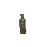 An Islamic Green Glass Bottle with Lovely Rainbow Patina from the 11-12th Century.

H: Approximately