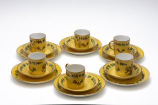 A Lot of Vintage Dresden Yellow Porcelain Tea Set Depicting Floral Patterns from Circa 1900s.

Inclu