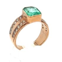 An Emerald and Diamond Ring in Rose Gold. Emerald Weight: Approximately 3.3ct Stamped 14K Ring Size
