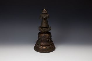 A Tibetan Bronze Gilted Buddhist Stupa. H: Approximately 30cm