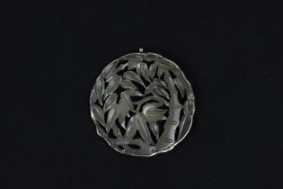 A Chinese Jade & Silver Pendant Depicting a Tree and Leaves. D: Approximately 6cm