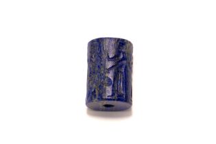 A Lapis Lazuli Cylindrical Seal Possibly Belonging to one of the Kings of Somer Depicting Noble Figu