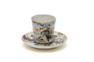 A Japanese Porcelain Cup with Saucer Depicting a Bird on a Tree from the 19th Century with Character