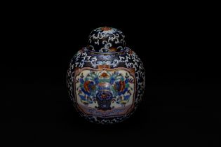 A Chinese Porcelain Jar Depicting Floral Patterns with Character Marks on the Base.