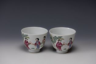 A Pair of Chinese White Ground Famille Rose Porcelain Cups with Character Marks to the Base.

H: App