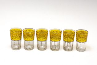 A Lot of 6 Vintage Bohemian Amber-Colour Glass Shot Glasses from the 20th Century.

H: Approximately