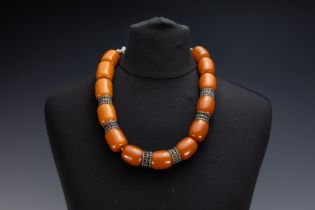 A Tribal Yemeni White Metal Necklace with Amber Colour Beads.

226g 