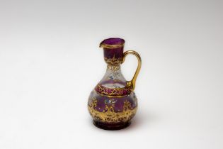 An Antique Bohemian Purple Glass Jug. H: Approximately 13cm