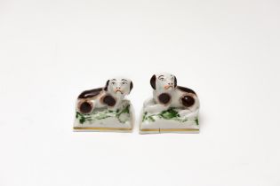 A Pair of Vintage Continental Miniature Porcelain Figures of Staffordshire Dogs.

H: Approximately 4