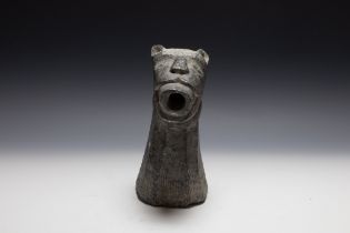 An Antique Indian Islamic Schist Spout in the Form of a Lion. 

H: Approximately 27cm 