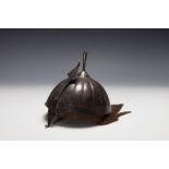 An Indo- Persian Steel Kulah Kud Helmet with Silver Floral Patterns from the 19th Century.

L: Appro