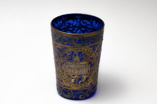 A Vintage Venetian Blue Glass Beaker Cup from the 19th Century.

H: Approximately 14cm 