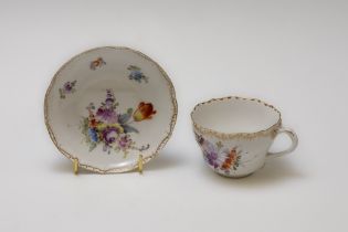 A Vintage Meissen White Tea Cup and Saucer Depicting Floral Patterns. 