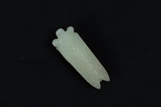 A Chinese Jade Pendant in the Shape of a Fly. L: Approximately 5.2cm