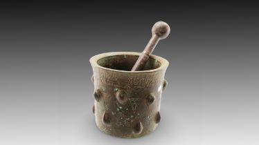 An Islamic Bronze Pestle and Mortar from the 12th Century

D of Mortar: Approximately 14.7cm
H of Mo