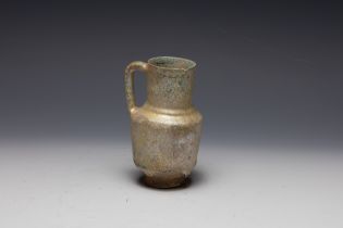 An Islamic Kashan Ceramic Jug from the 12th Century.

H: Approximately 11.3cm 