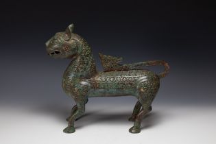 A Large Chinese Islamic Bronze Lion with Intricate Carving with Character Marks to the Base. H: App