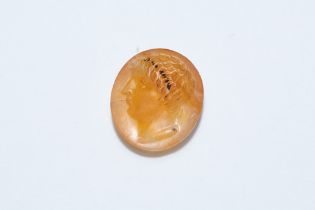 An Ancient Roman Yellow Agate Oval Stone Depicting a Roman Deity's Head. L: Approximately 1.9cm