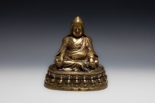 A Rare Tibetan Bronze Buddhist Statue. H: Approximately 19cm