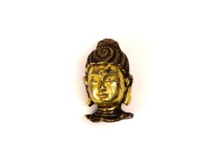 A Chinese Tibetan Bronze Gilt Buddha Head. H: Approximately 4.7cm