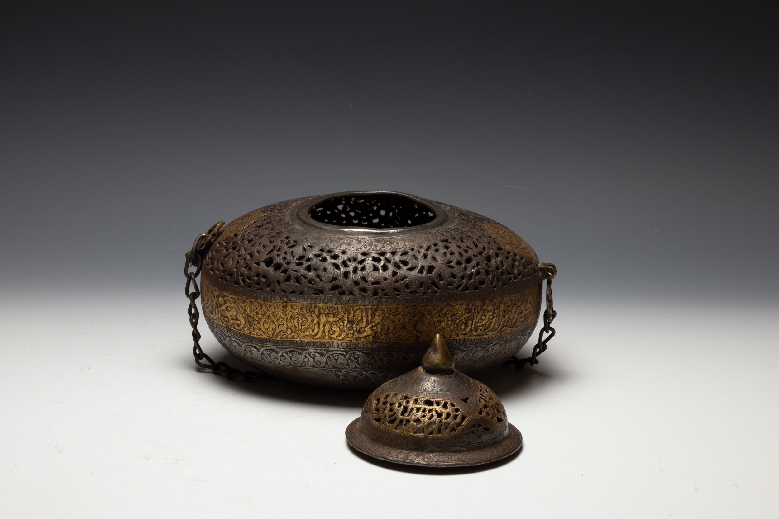 An Islamic Iron Kashkul + Lid with Gilt Inlay, Lovely Openwork and Islamic Calligraphy. 

L: Approxi - Image 4 of 4