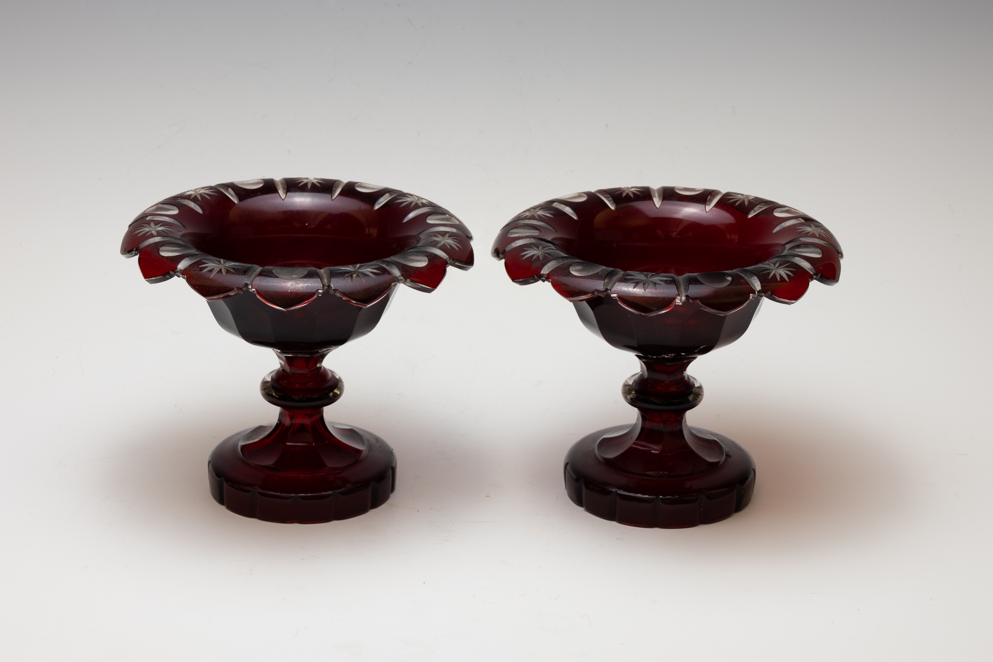 A Pair of Antique Bohemian Ruby Red Glass Tazza Bowl from the 19th Century.

H: Approximately 15cm 