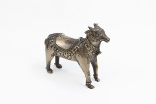 An Indian Mughal Bronze Figure of a Cow. L: Approximately 14.5cm