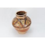An Islamic Samanid Pottery Jar from the 10-11th Century Decorated with Enamel Work.

H: Approximatel