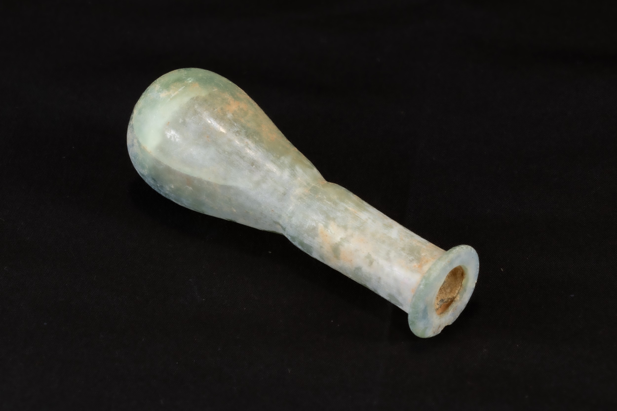 An Ancient Roman Glass Unguentarium Blown from Pale Translucent Glass with a Slight Teal Tint Circa  - Image 3 of 3