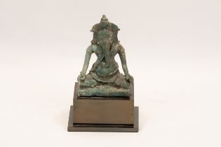 A Cambodian Bronze Figure of Ganesh from the 12th Century. H with Stand: Approximately 12cm H: Appr