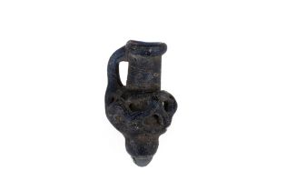 An Ancient Roman Dark Blue Glass Miniature Juglet Pendant Circa 1st-3rd Century A.D. Approximately
