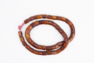 A Tribal Yemeni Amber Coloured Beads Necklace. 53g
