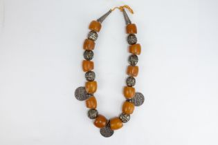 A Tribal Yemeni Amber and Silver Beads Necklace with Islamic Coins from the 19th Century. 211g